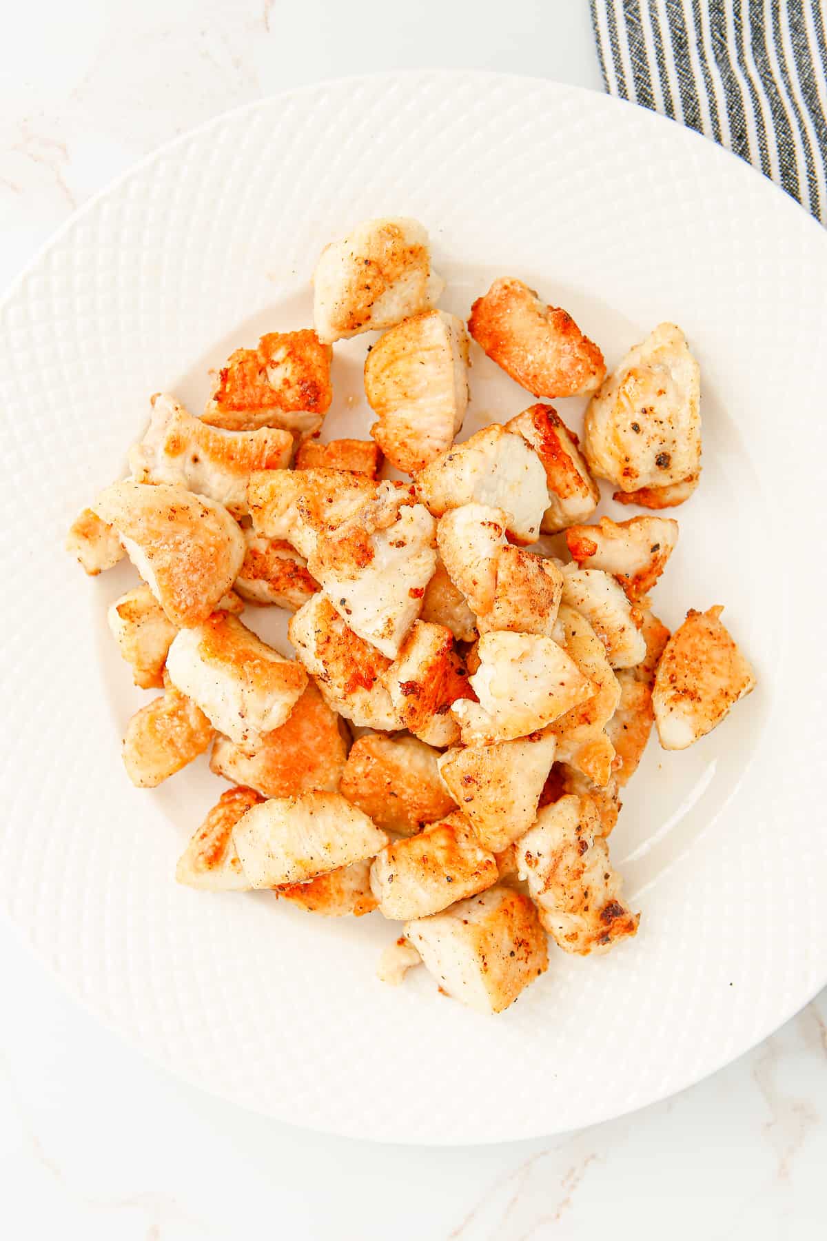 pan fried chicken pieces on plate