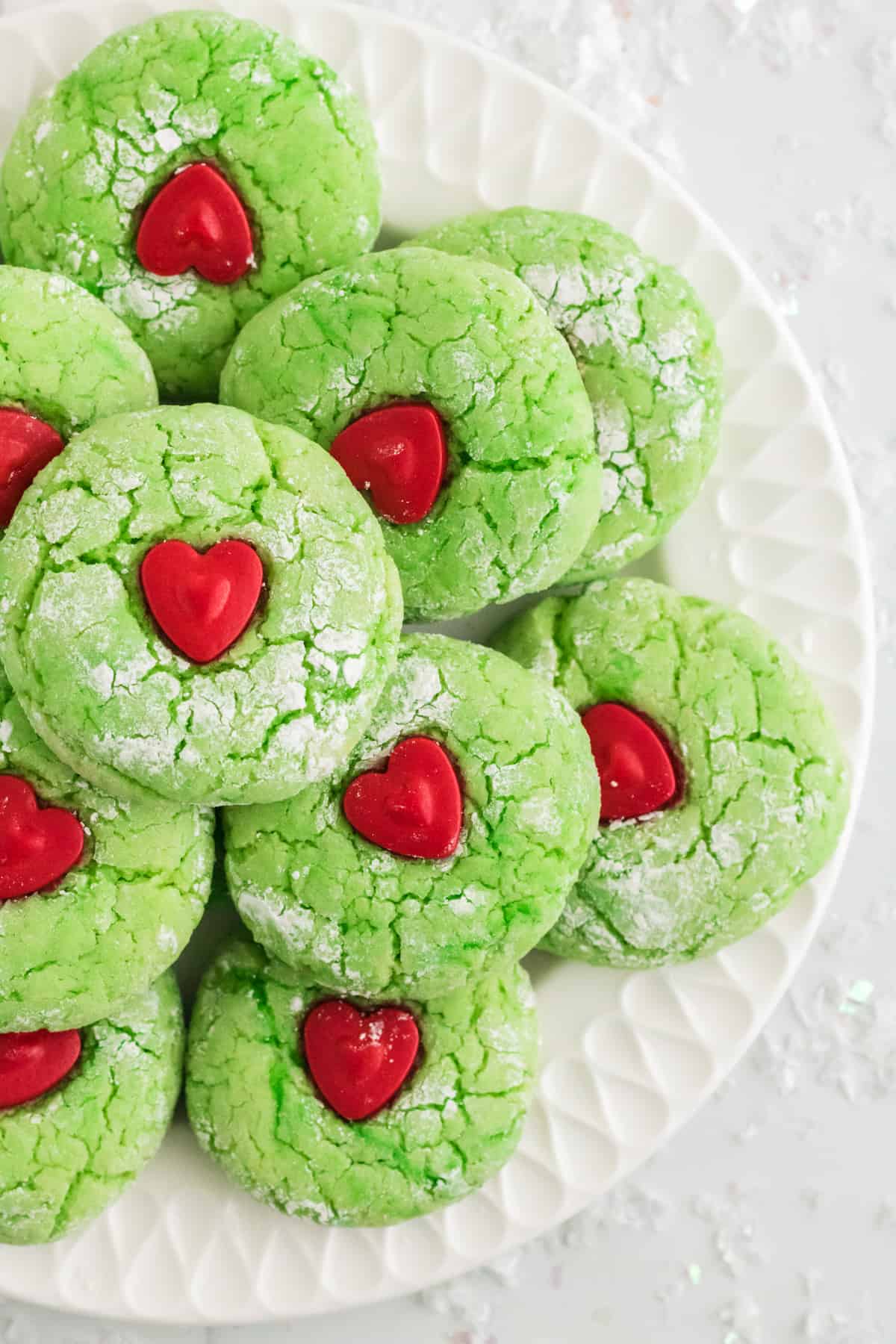 Grinch Heart Cookies on white plate