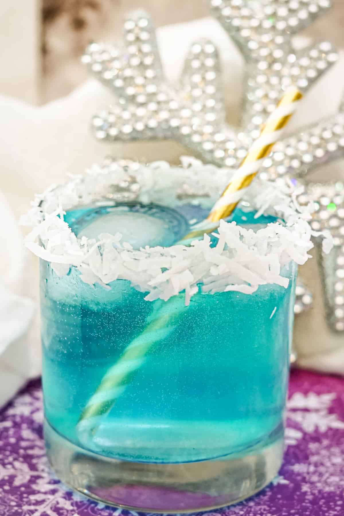 jack frost cocktail on the rocks with coconut rim