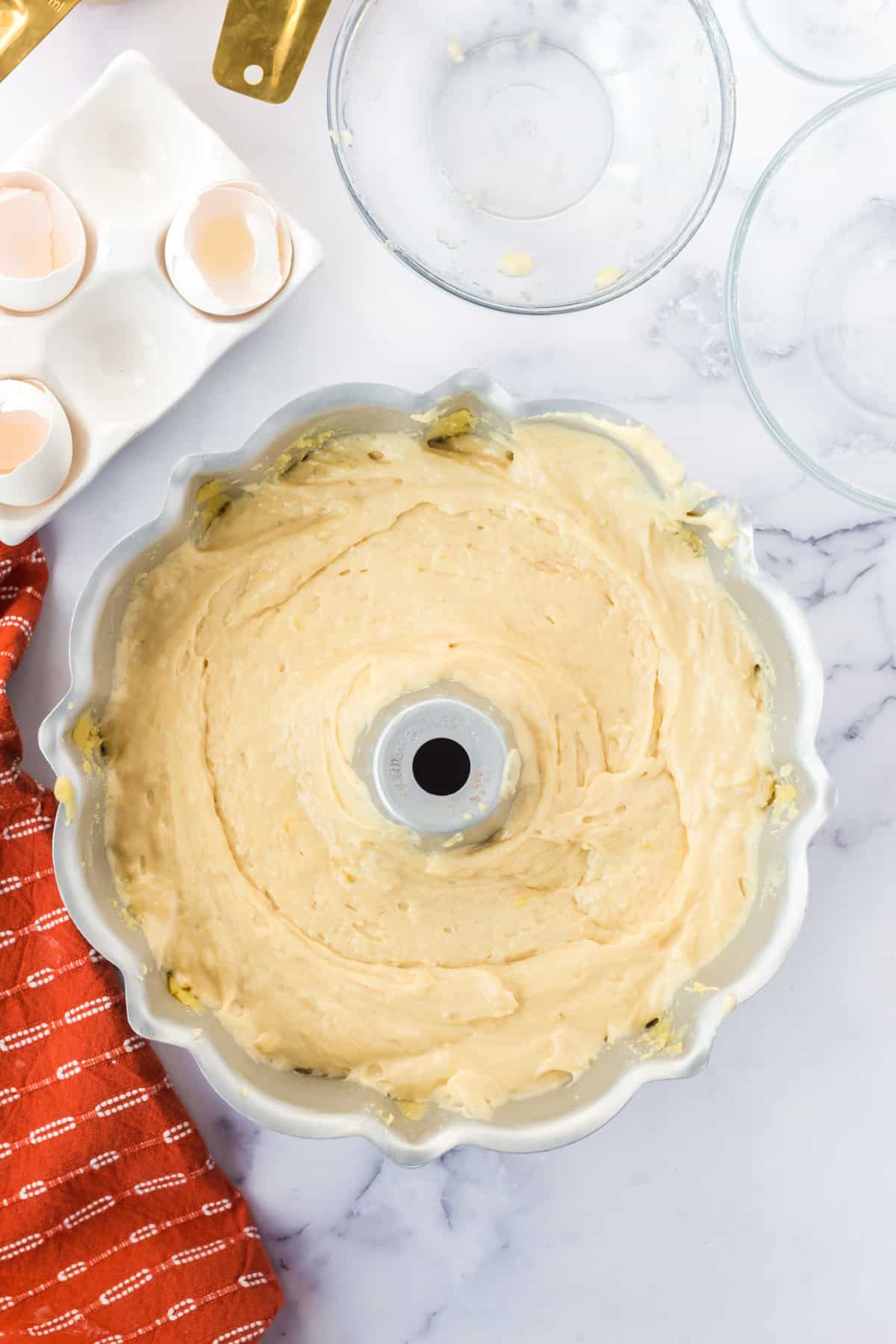 banana cake batter in bundt pan