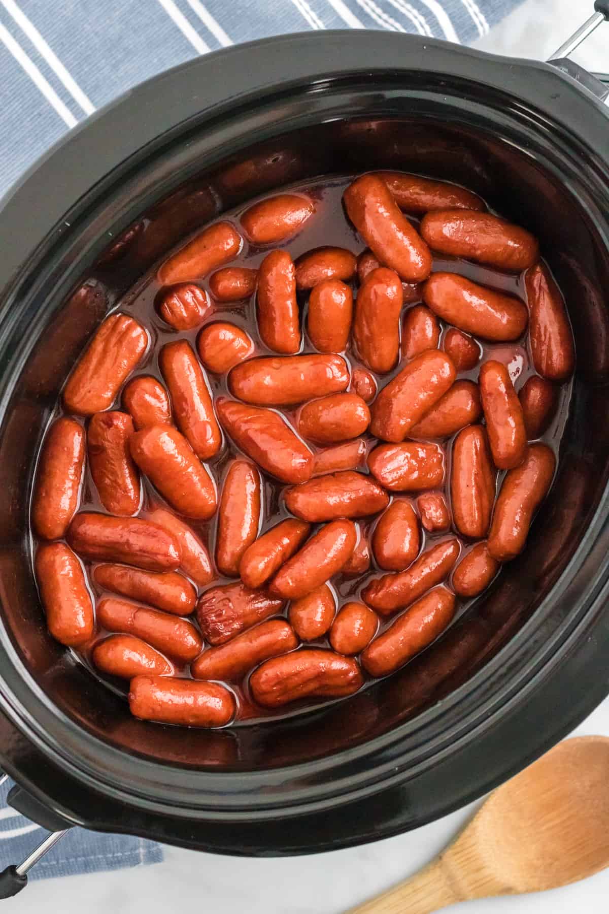 Crockpot lil smokies with sweet and savory bbq sauce.