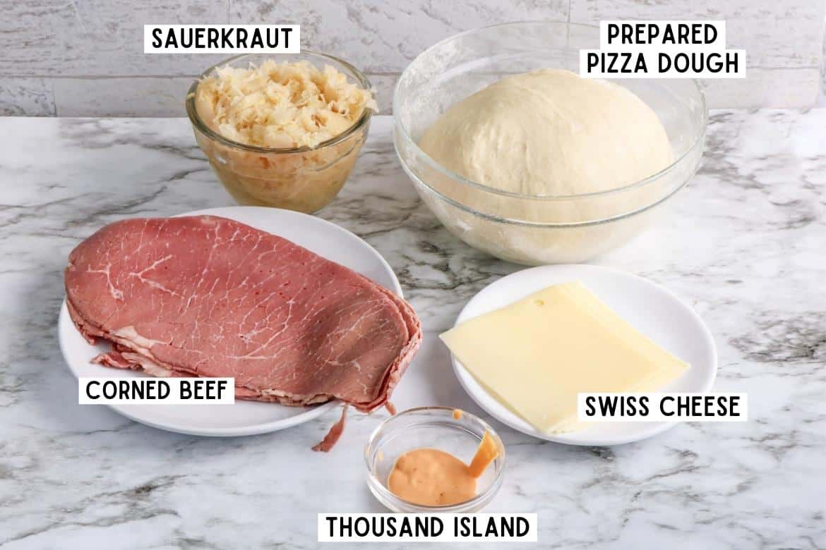 Sauerkraut, pizza dough, swiss cheese, corned beef, thousand island