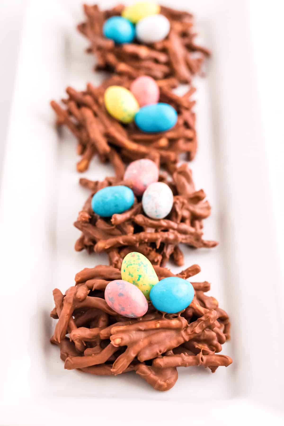 Colorful eggs in chow mein nests.