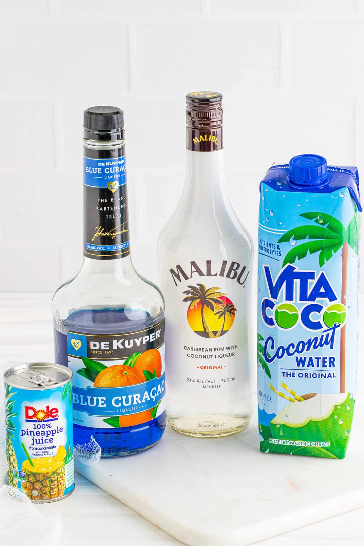 Pineapple juice, Blue Curaco, Malibu, and coconut water.