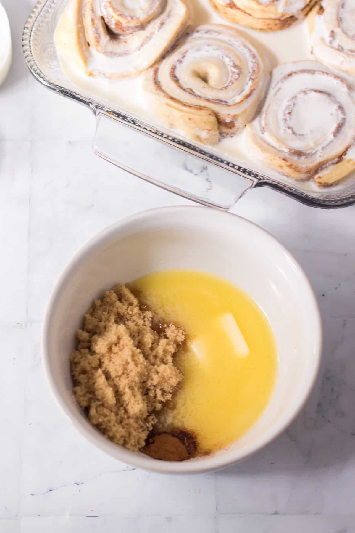 Small bowl with melted butter and brown sugar.