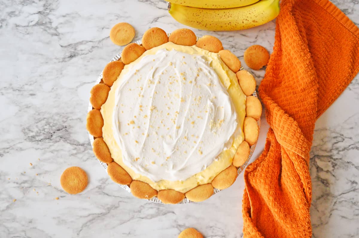 Banana pudding pie with cool whip and nilla wafers in a graham cracker crust.