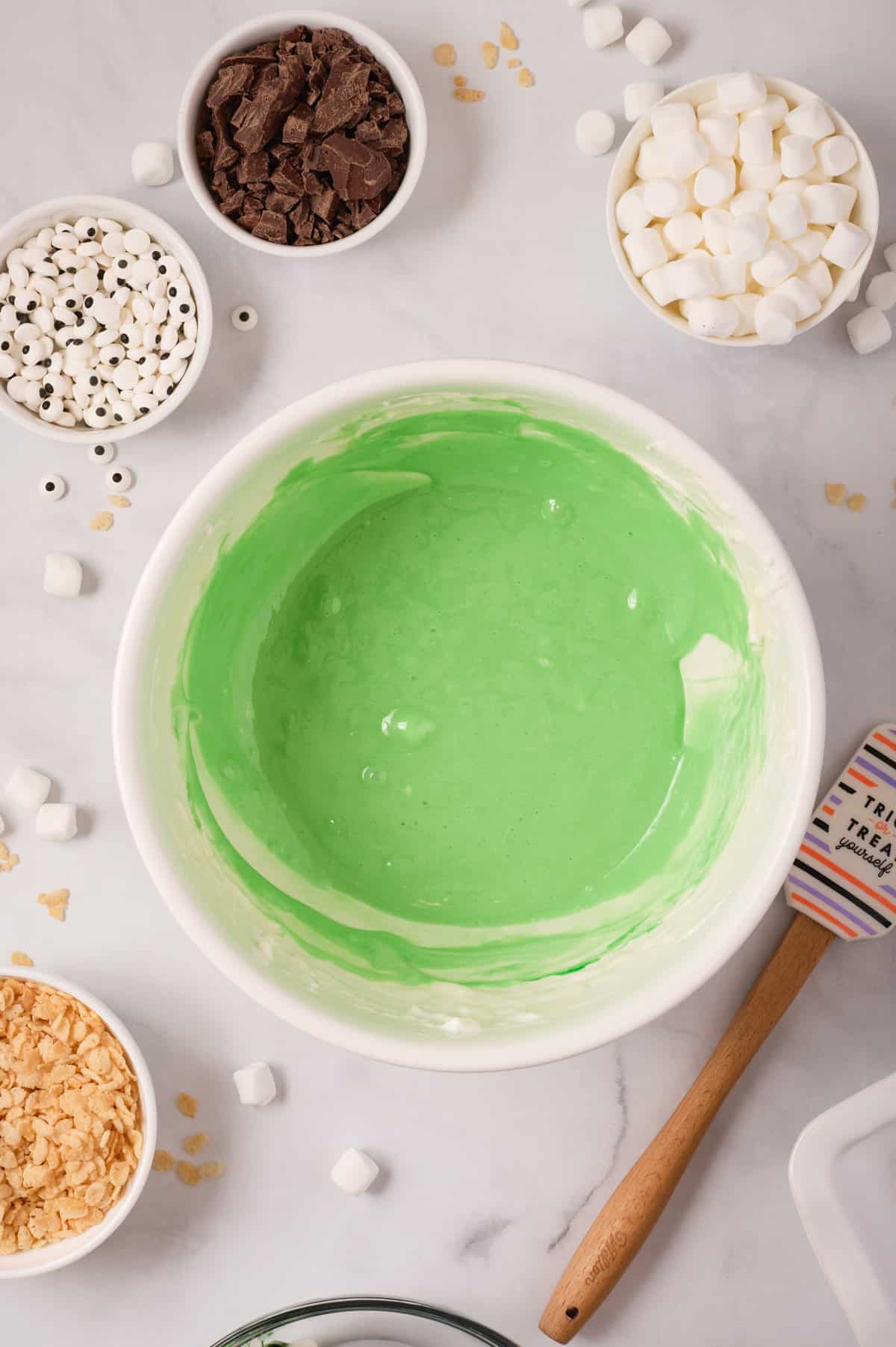 Green marshmallow mixture in bowl.