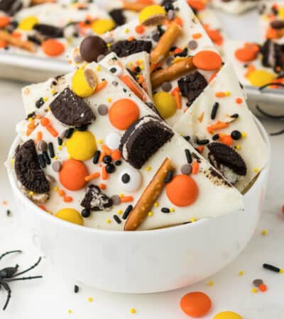 Halloween Bark Recipe with pretzels, oreos, and halloween candy.,