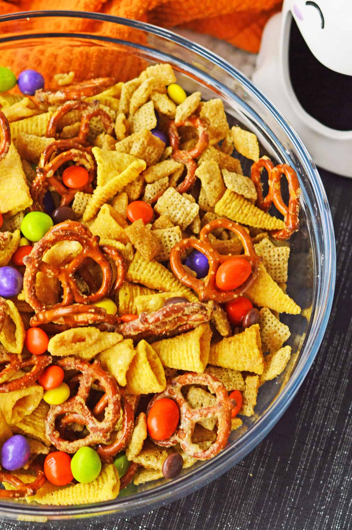 Close up photo of sweet and salty halloween chex mix.