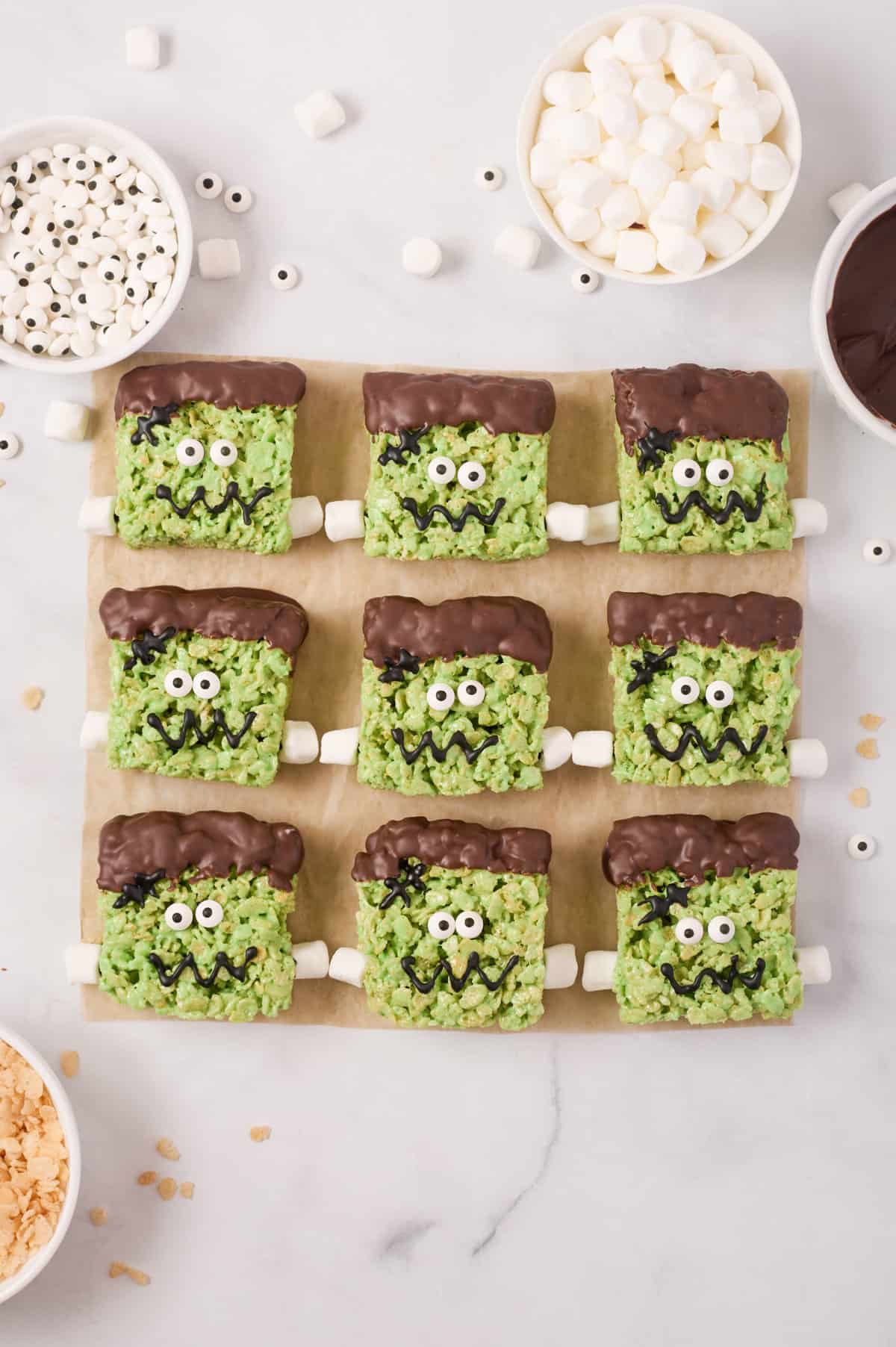 Treats with mini marshmallows added on either side of bottom third to look like bolts in neck.