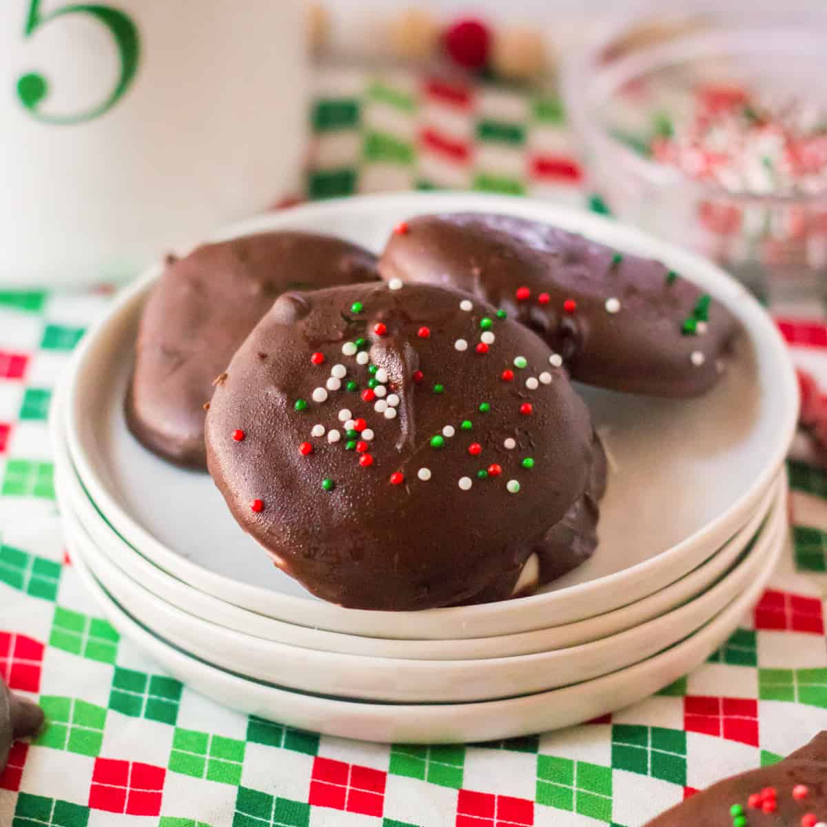 Homemade peppermint patties with Christmas sprinkles.