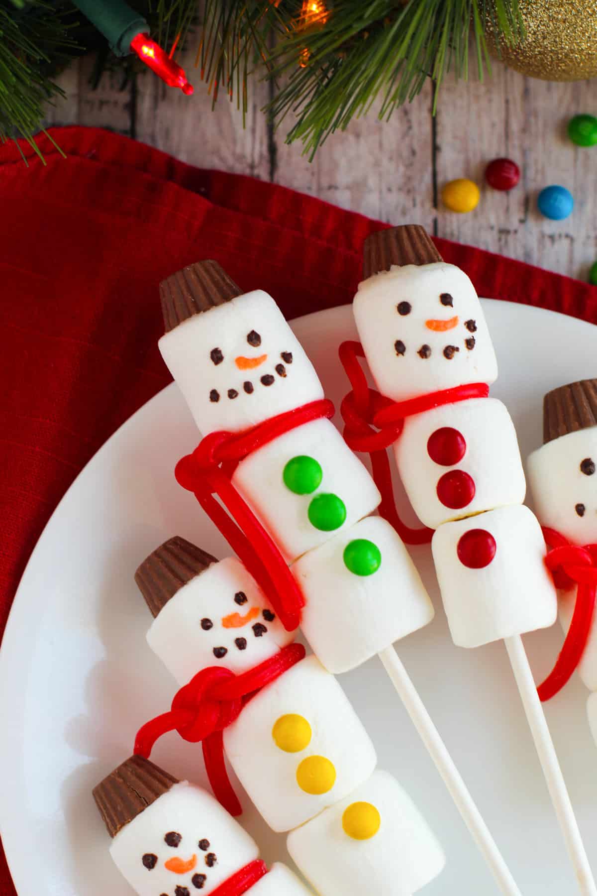 Snowman marshmallow treats on sticks.
