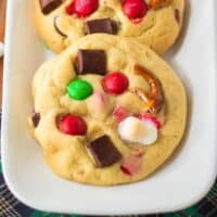 Kitchen sink cookies with Christmas M&Ms, mini marshmallows, pretzel pieces, and chocolate chunks.