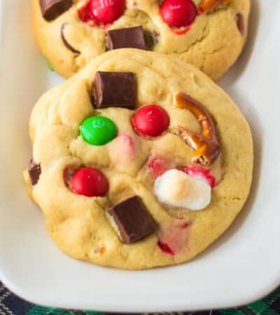 Kitchen sink cookies with Christmas M&Ms, mini marshmallows, pretzel pieces, and chocolate chunks.