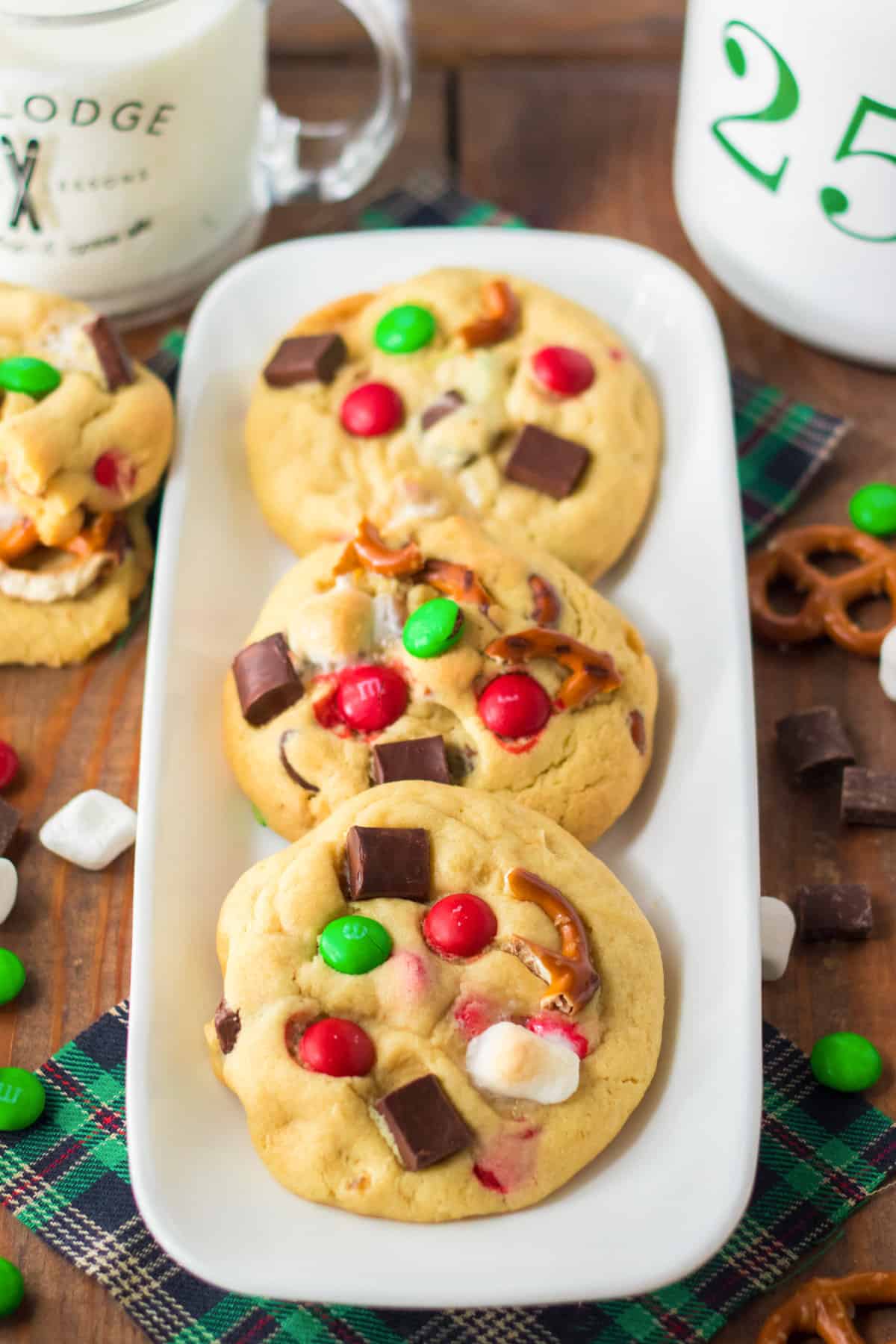 Christmas kitchen sink cookies with pretzel pieces, green and red M&Ms, mini marshmallows, and chocolate chunks.