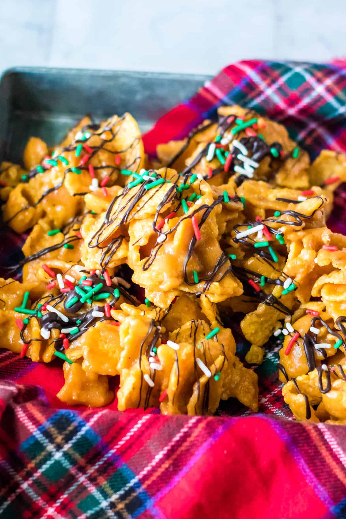 Peanut butter fritos candy in holiday napkin napkin lined serving tray..