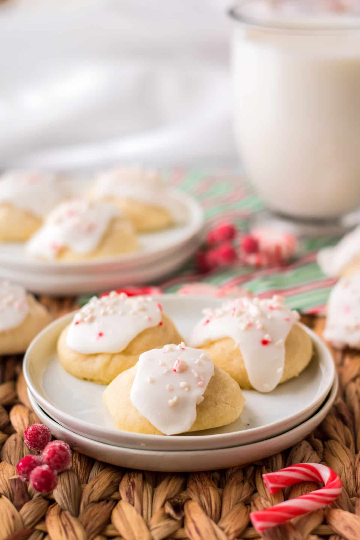 Peppermint meltaway cookies with icing and crushed candy canes on top.