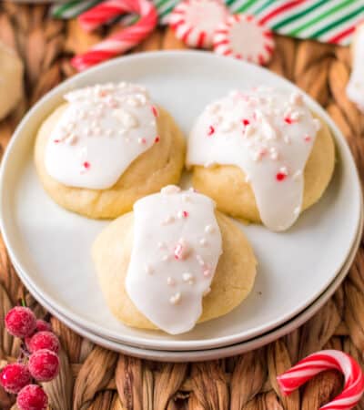 Peppermint meltaway cookies; pale, round cookies topped with icing and crushed peppermint candies.