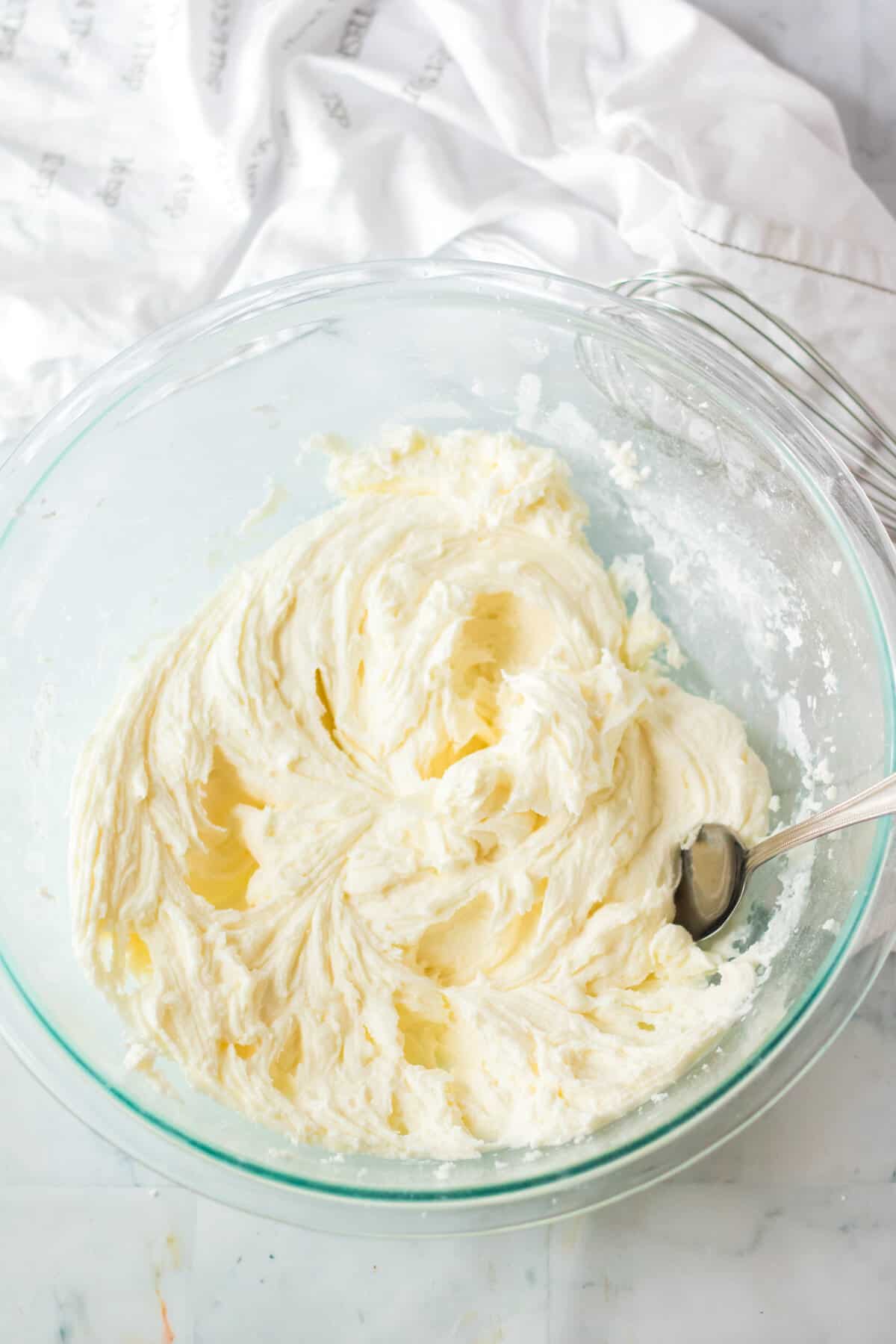 Bowl of vanilla buttercream frosting.