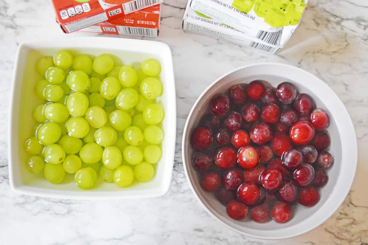 Grapes in bowls of water.