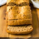 The best easy banana bread on a cutting board and cut into slices.