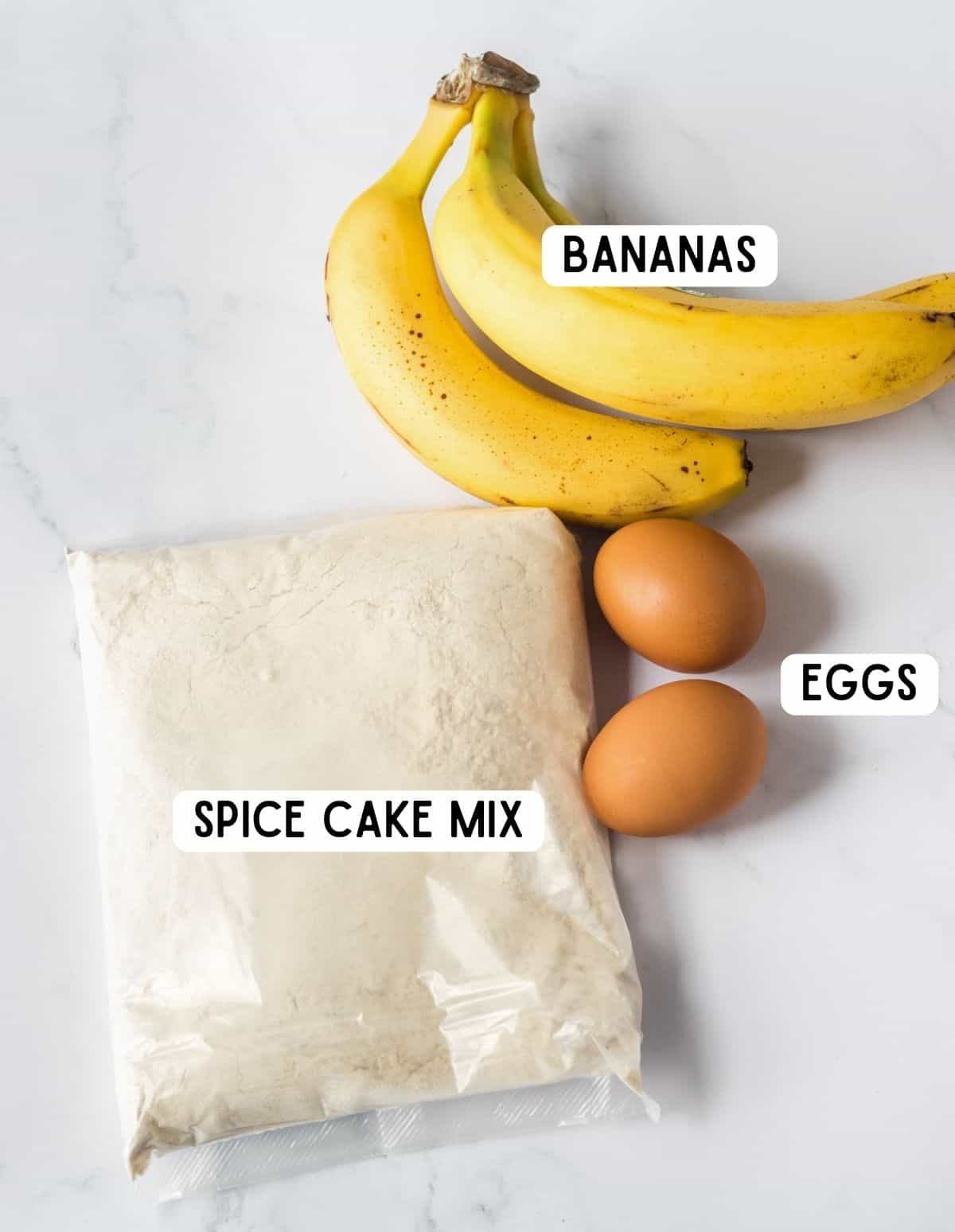 Banana bread ingredients: spice cake mix, 3 ripe bananas, and 2 eggs.