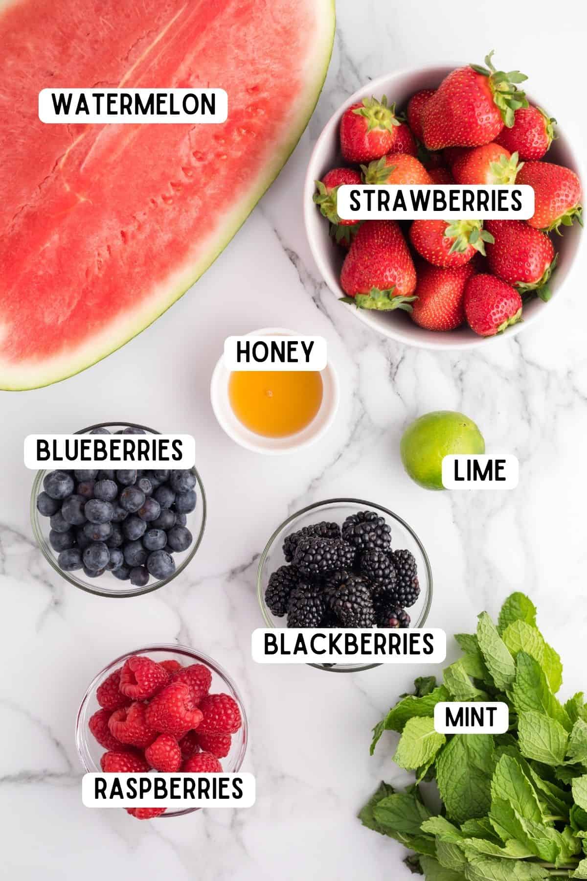 Seedless watermelon, strawberries, honey, lime, blackberries, raspberries, blueberries and fresh mint.