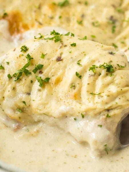 Creamy 4 ingredient oven baked pork chops with cream of mushroom soup.