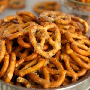 Garlic ranch pretzels in a silver bowl.