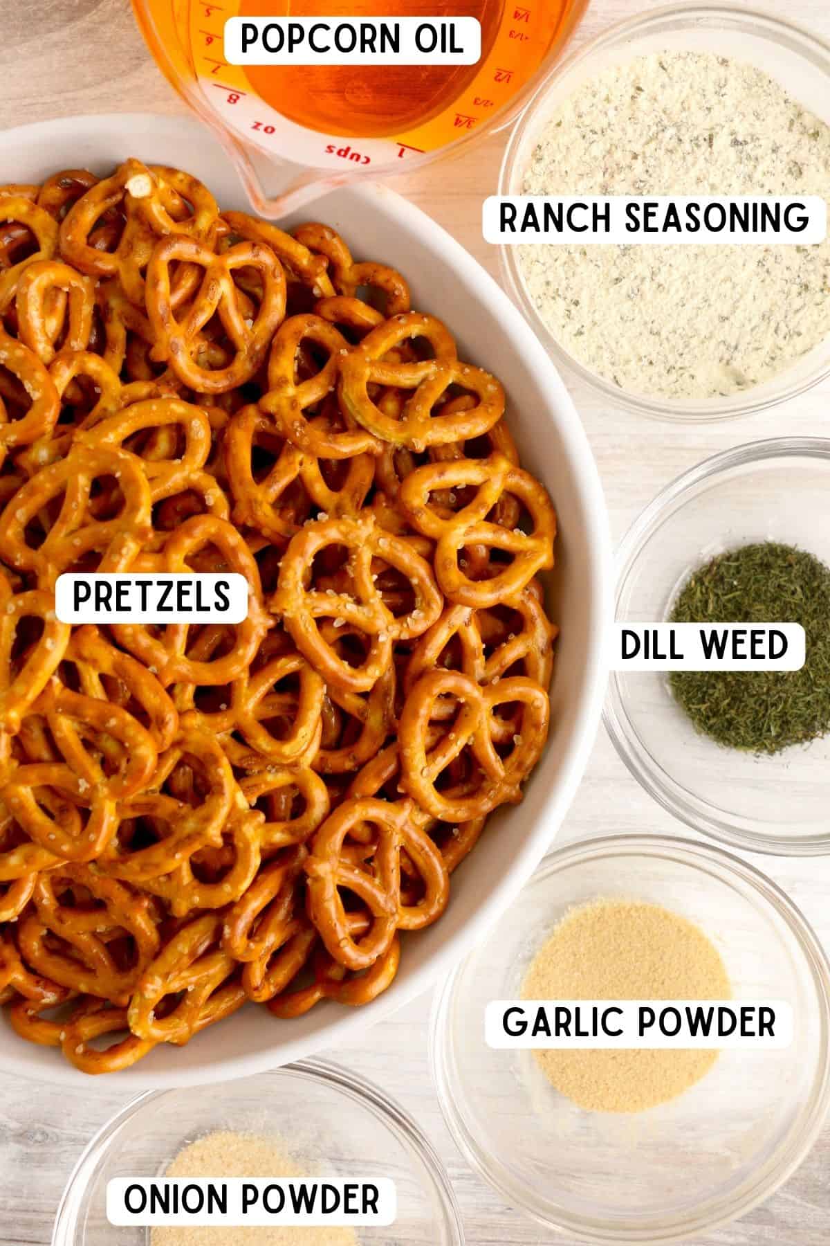 Pretzel twists, popcorn oil, ranch seasoning, garlic powder, dill weed, and onion powder.