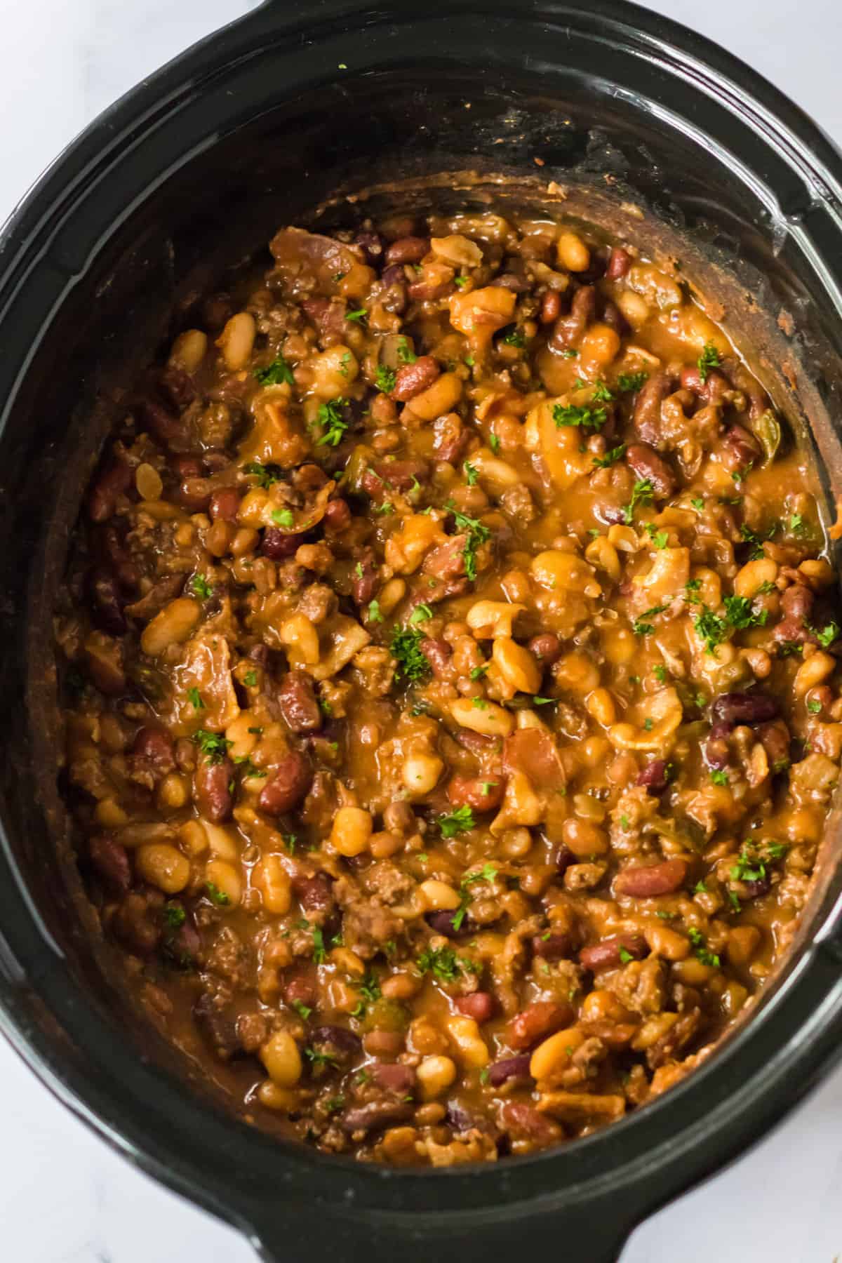 Calico beans in the slow cooker.