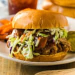 Root beer pulled pork sandwich with coleslaw.