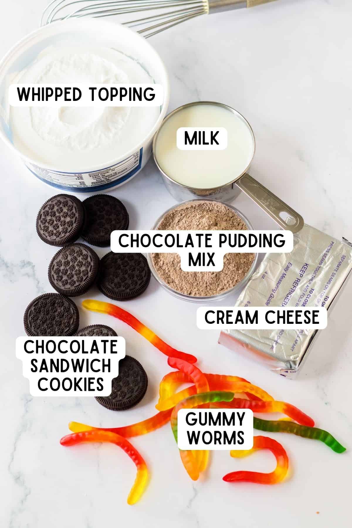 Ingredients for dirt and worms pudding - whipped topping, milk, chocolate pudding mix, chocolate sandwich cookies, cream cheese, and gummy worms.