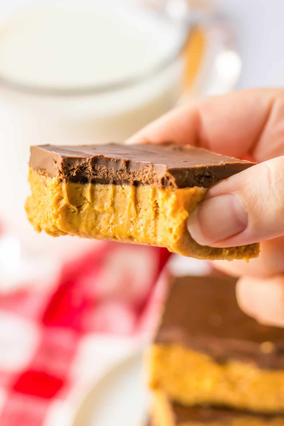 No bake peanut butter bar with a bite taken out of it.