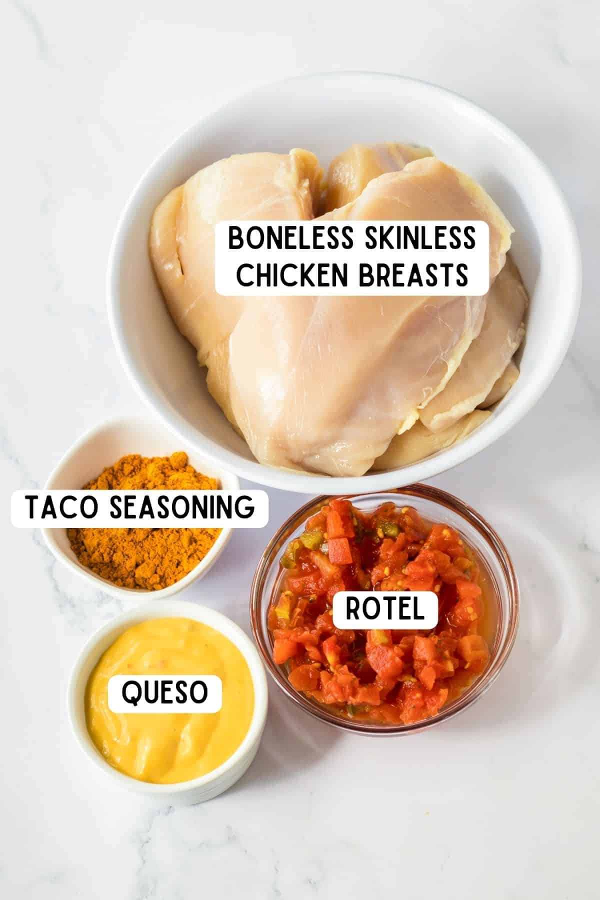 Boneless skinless chicken breasts, taco seasoning, rotel, and queso.