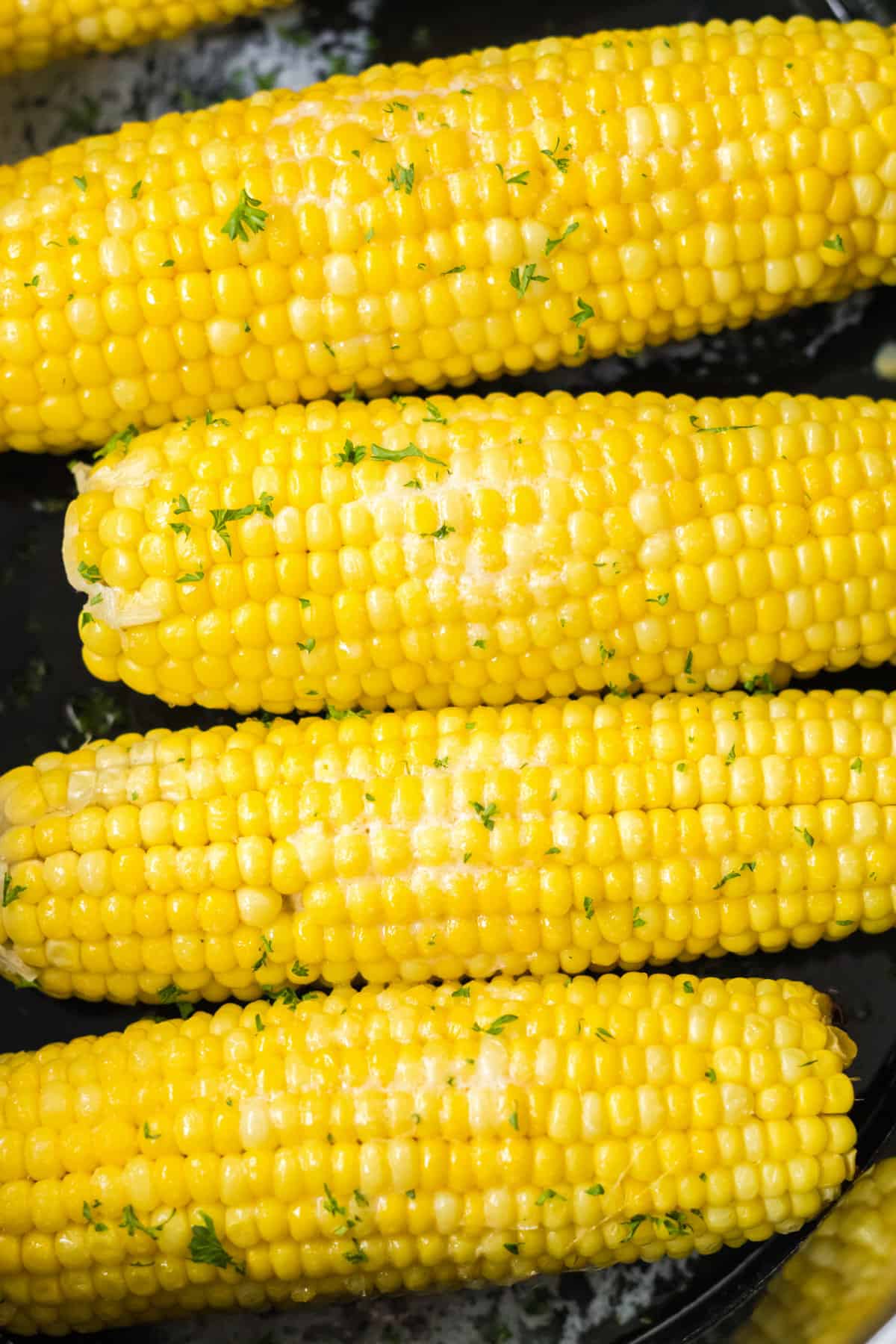 Perfectly cooked slow cooker corn on the cob.