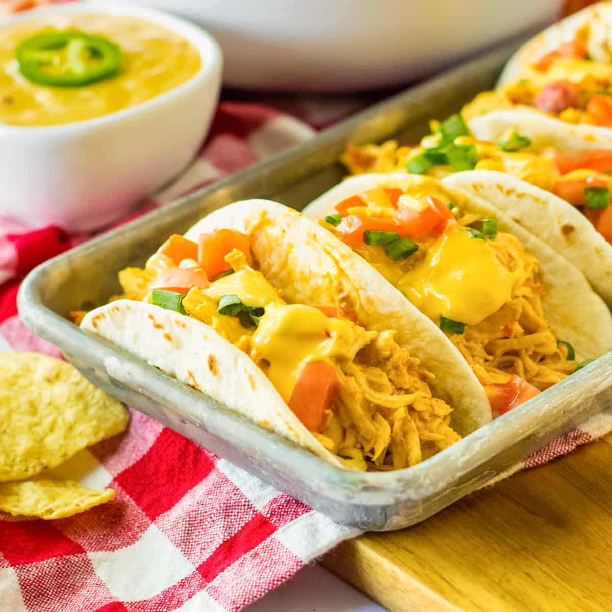 https://crayonsandcravings.com/wp-content/uploads/2023/07/Slow-Cooker-Queso-Chicken-Tacos.jpg