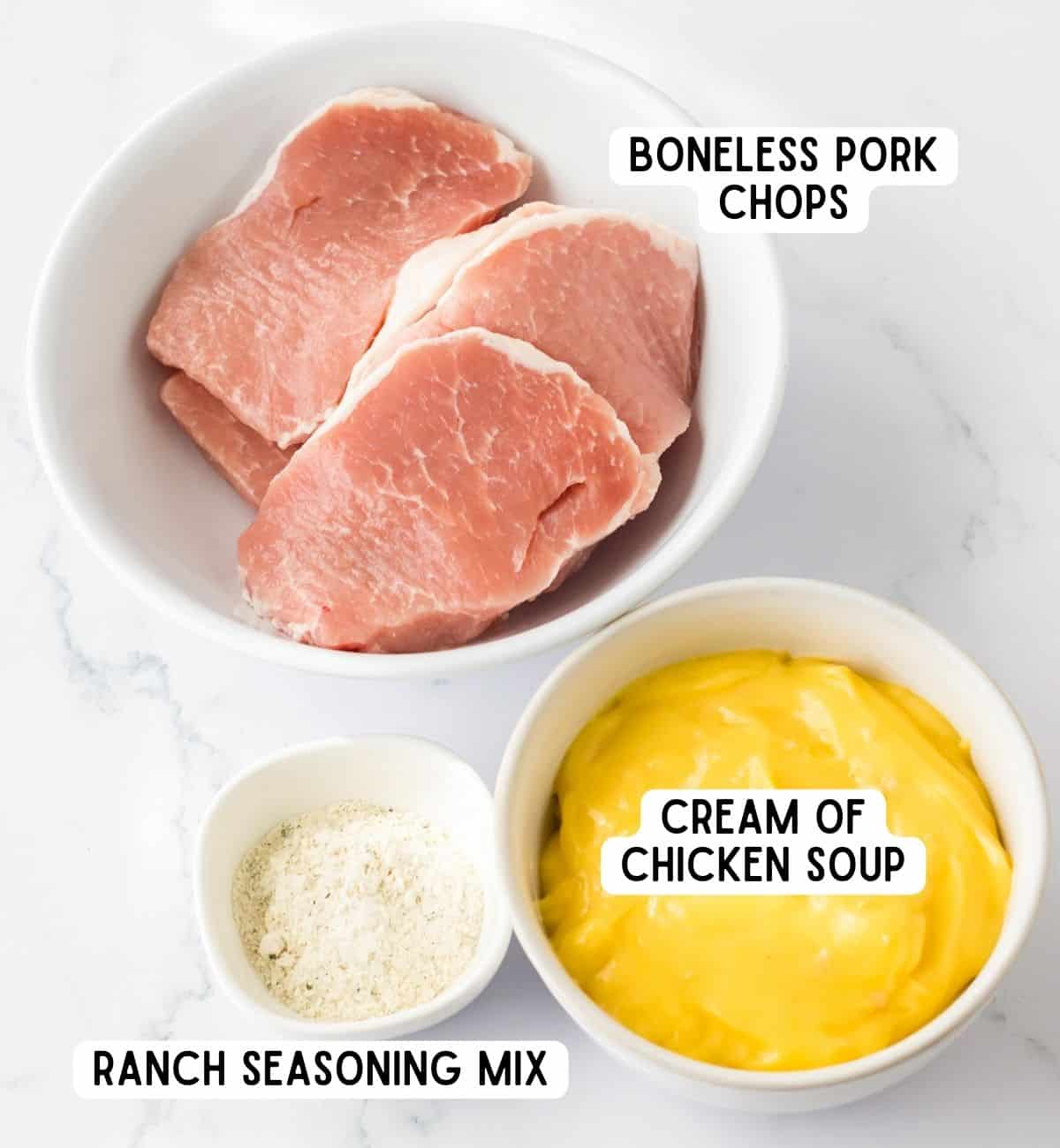 Boneless pork chops, cream of chicken soup, and ranch seasoning mix.