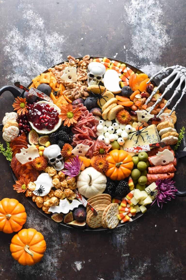Halloween Charcuterie Board with cured meats, cheeses, and other small snacks.