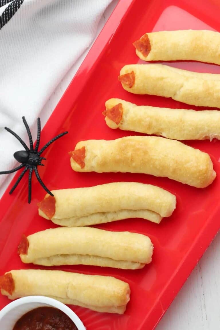 Breadsticks decorated to look like witches fingers.