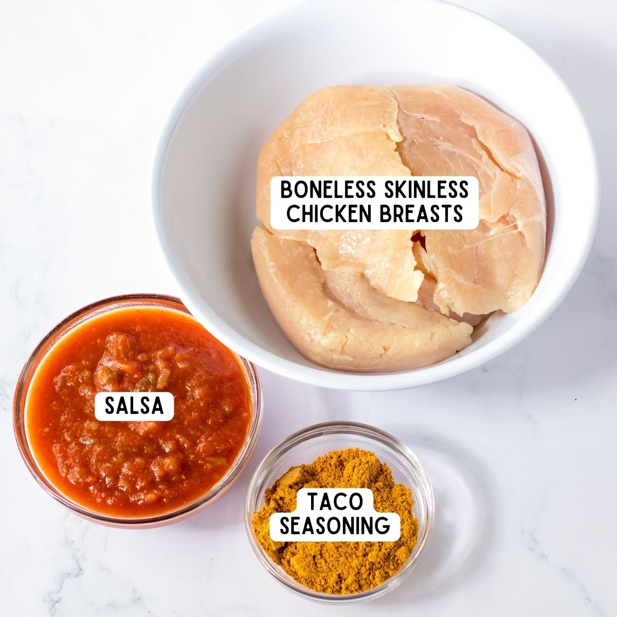 Boneless skinless chicken breasts, salsa, and taco seasoning.