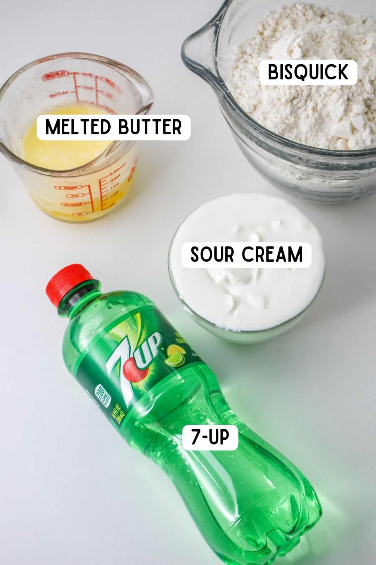 Melted butter, bisquick, 7 up soda bottle, and sour cream.