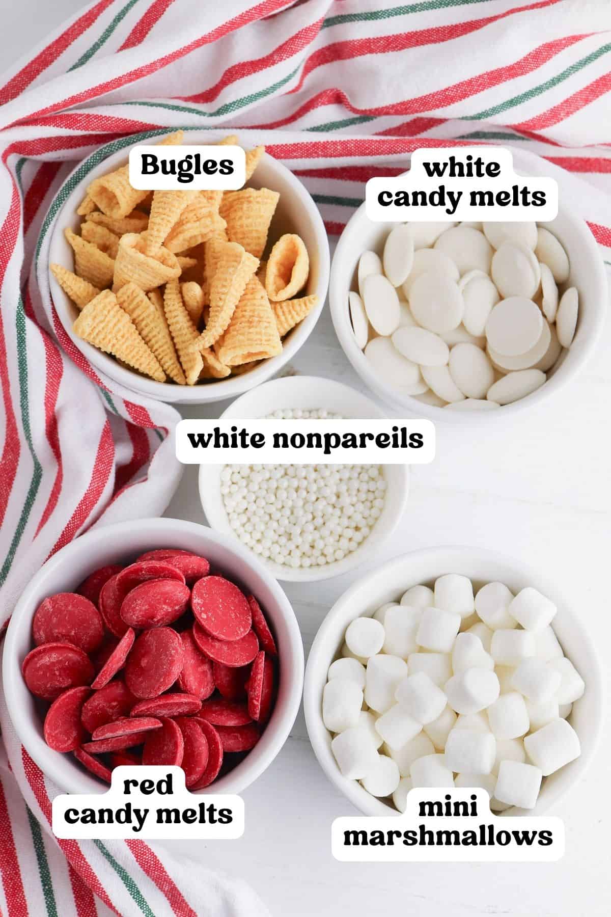Bugles, white candy melts, red candy melts, white nonpareils, and mini marshmallows.