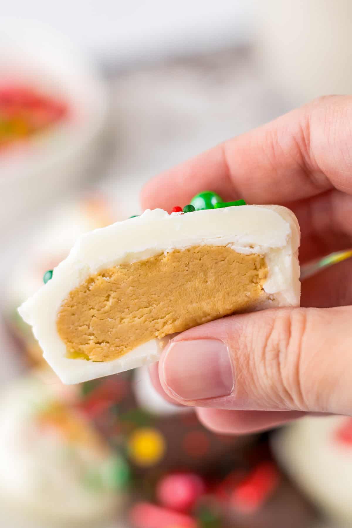 Thick peanut butter filling inside homemade white chocolate peanut butter cup.