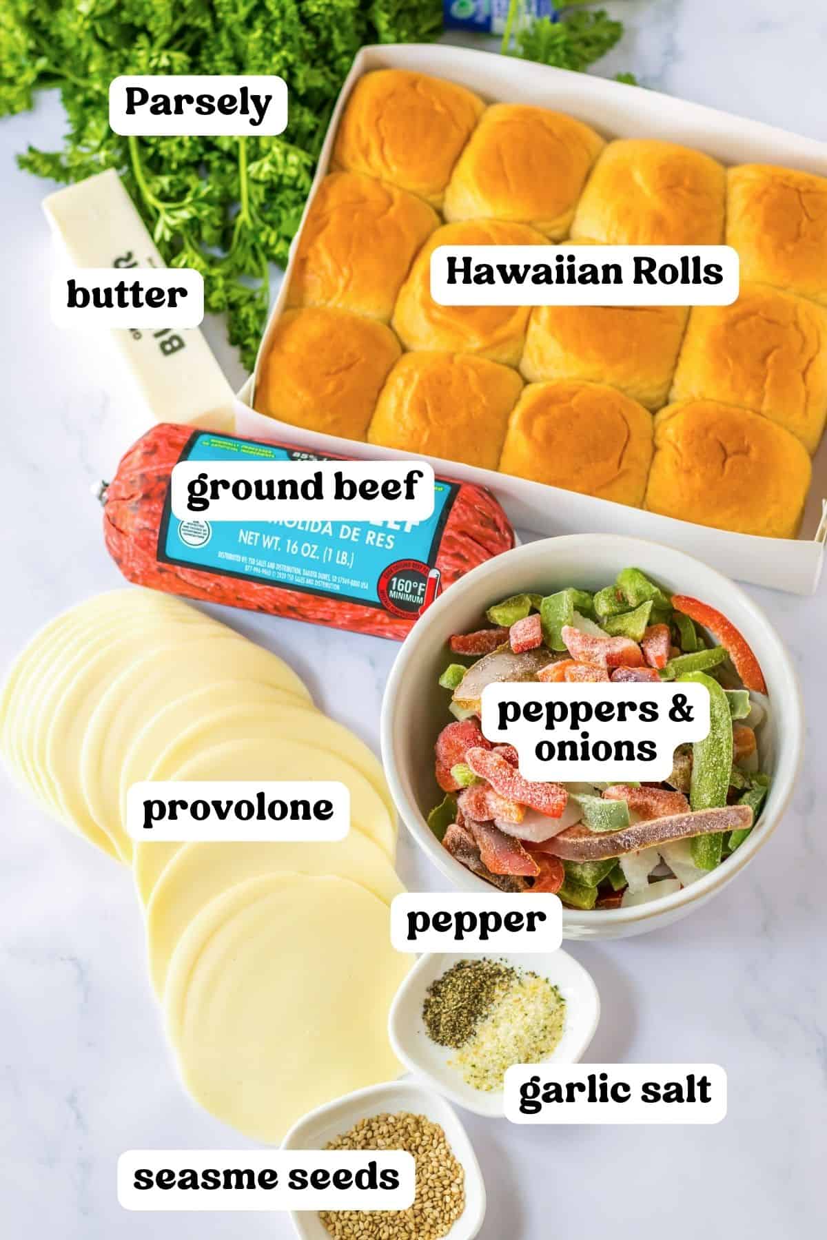 Hawaiian Slider Rolls, ground beef, parsley, frozen peppers and onion, provolone cheese slices, sesame seeds, butter, garlic salt, and pepper.