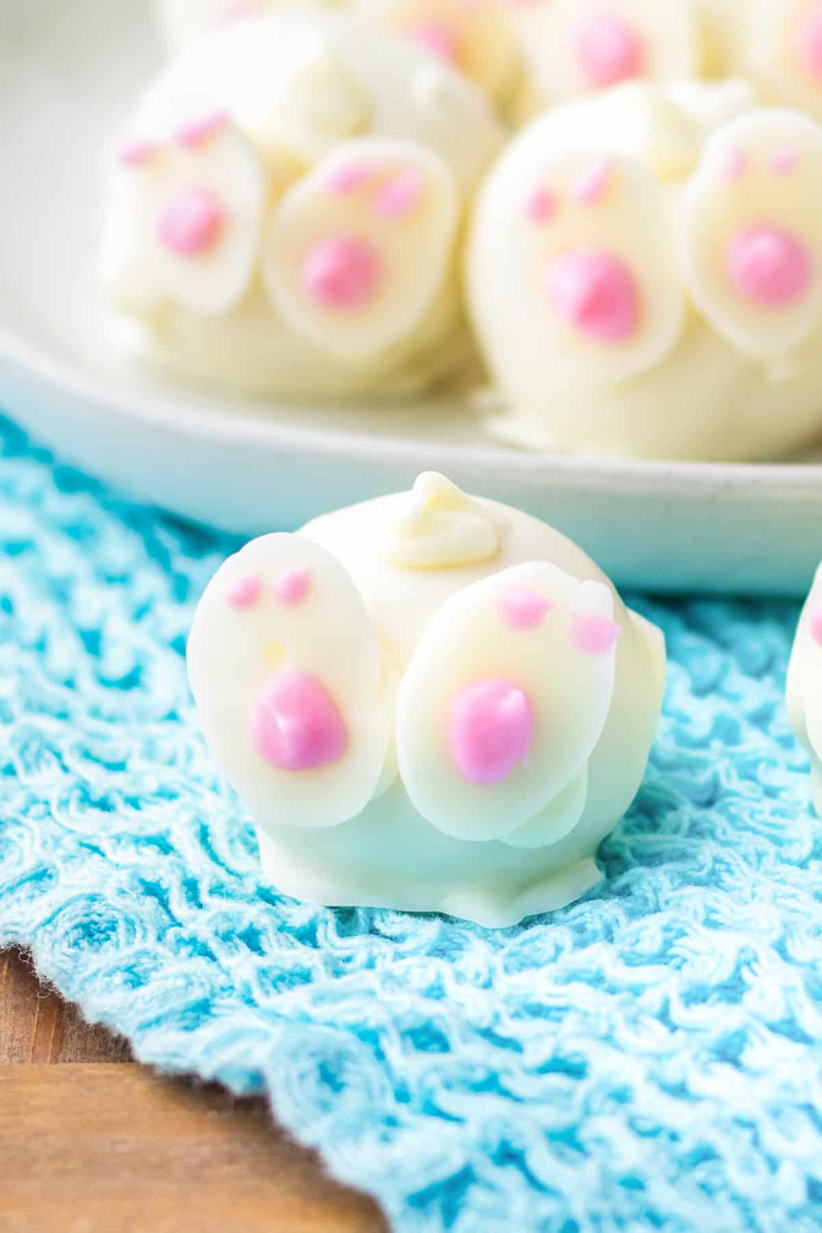 Easter bunny white chocolate truffle with pink details on feet.