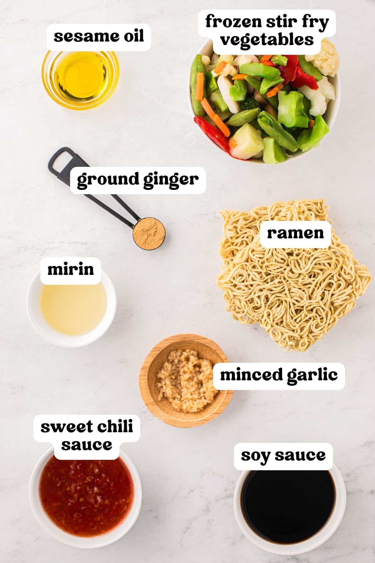 Ingredients on countertop: frozen stir-fry vegetables, ramen noodles, minced garlic, mirin, sesame oil, ginger powder, soy sauce, and sweet chili sauce.