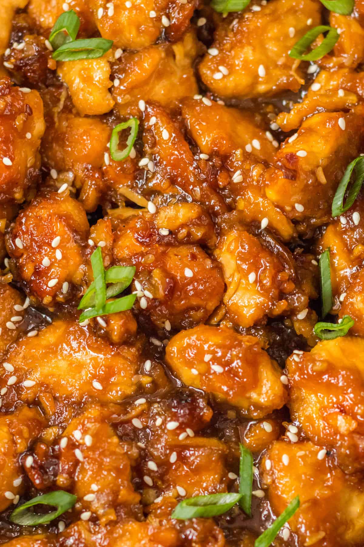 Bite-size pieces of take-out style orange chicken.
