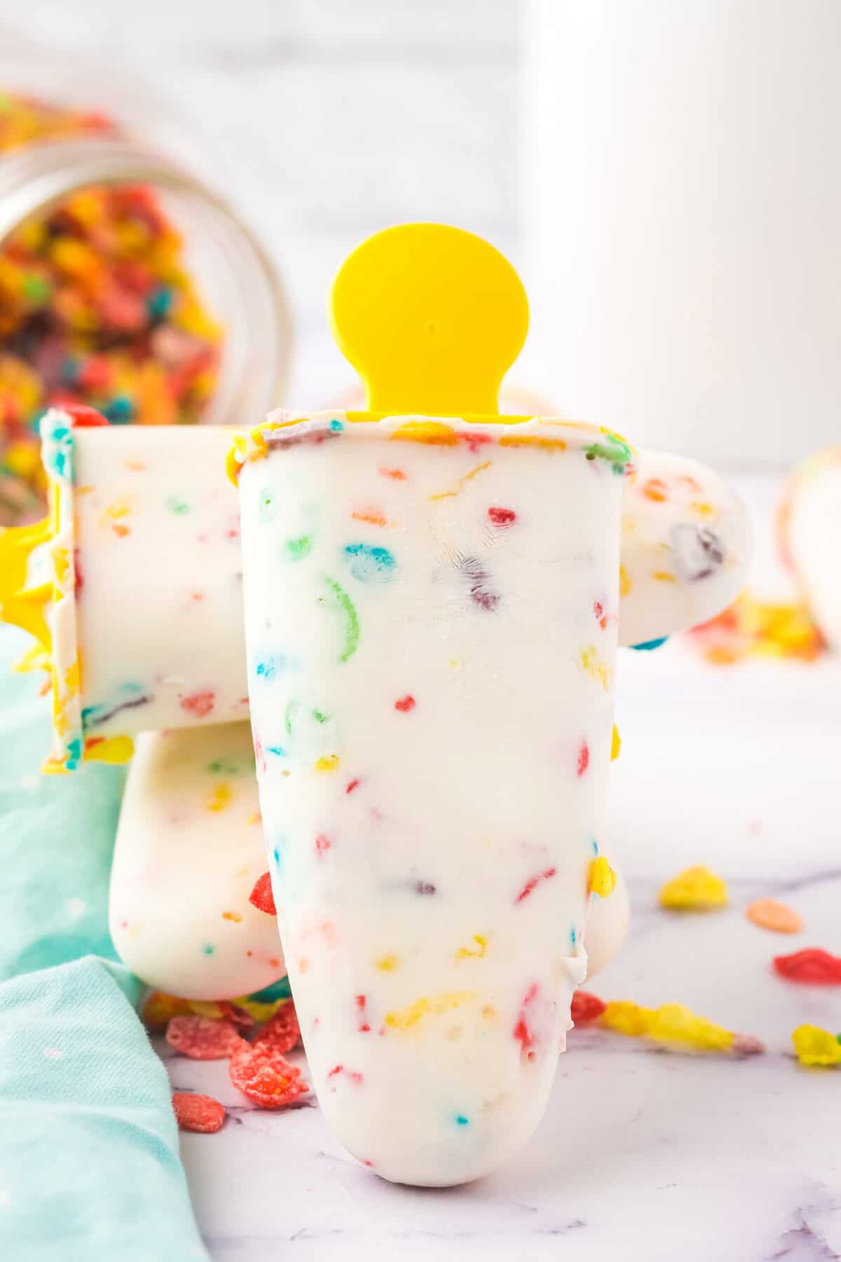 Fruity Pebbles Cereal Popsicles made with Greek Yogurt.