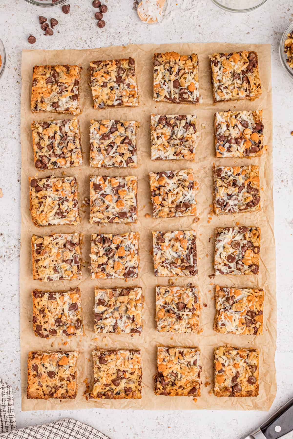 Magic cookie bars sliced into 24 even squares.